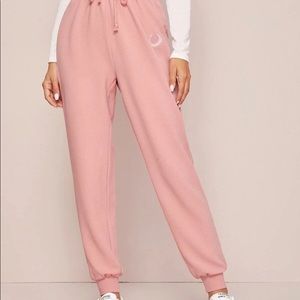 Pink embroidered leaf high-rise joggers